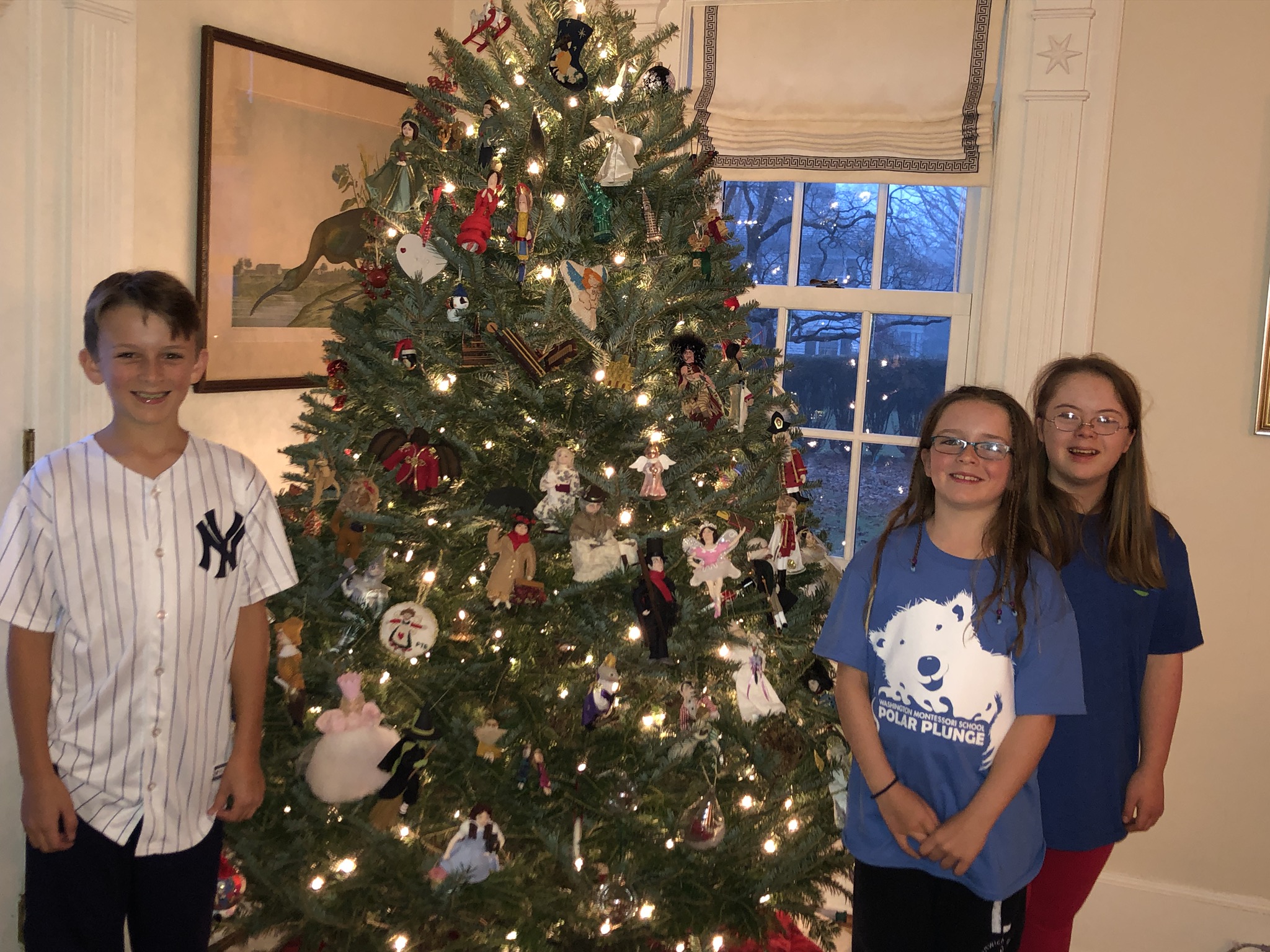 becker family in front of Christmas tree