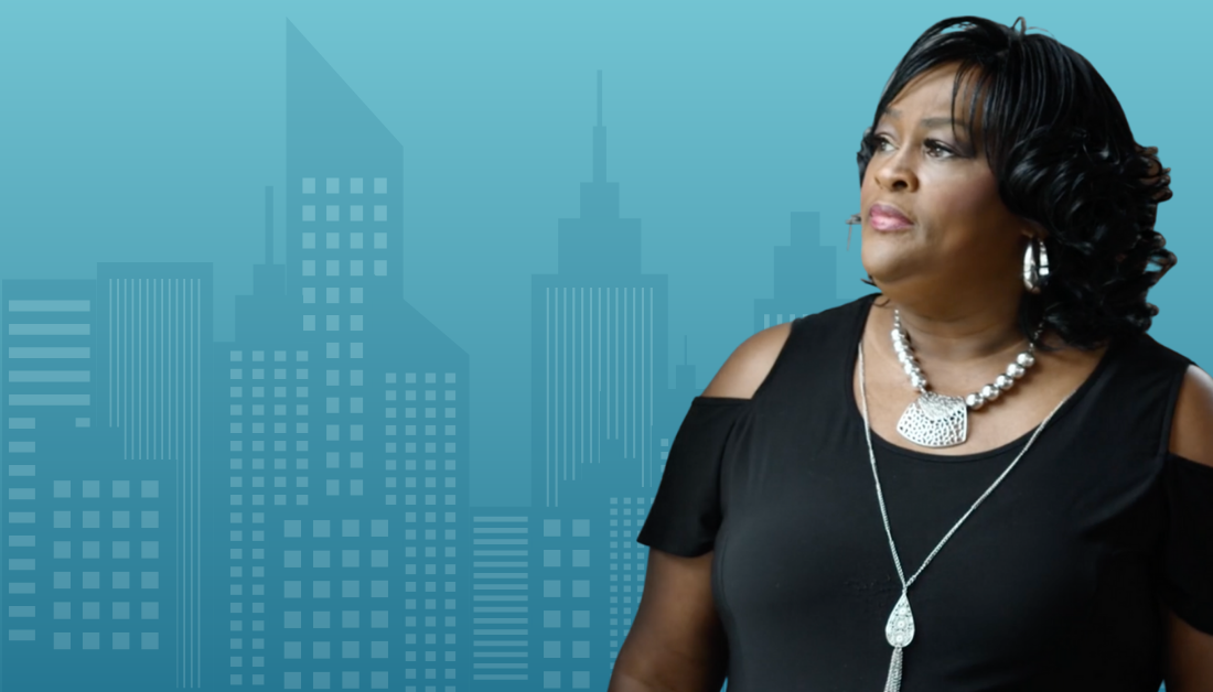 graphic with blue gradient background and blue cityscape, with a picture of Dorris Walker-Taylor