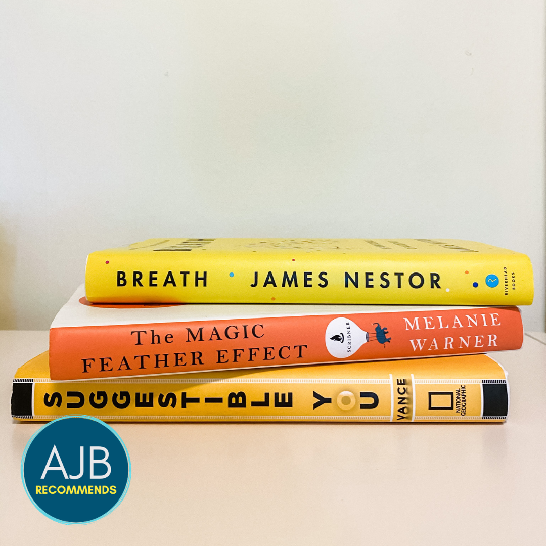 picture of three books stacked on top of each other: Suggestible You, The Magic Feather Effect, Breath and the AJB Recommends logo