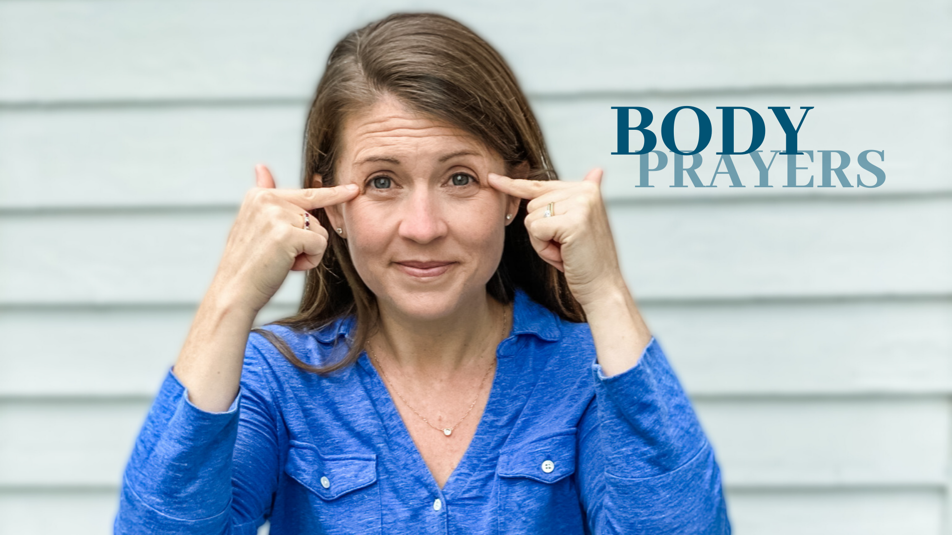 picture of Amy Julia pointing to her eyes with text overlay that says Body Prayers