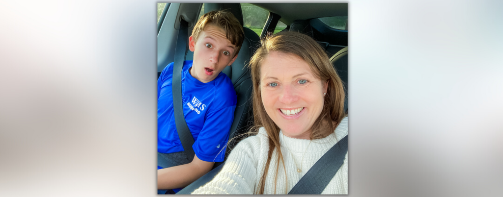 William and Amy Julia sit in a vehicle and pose for a selfie