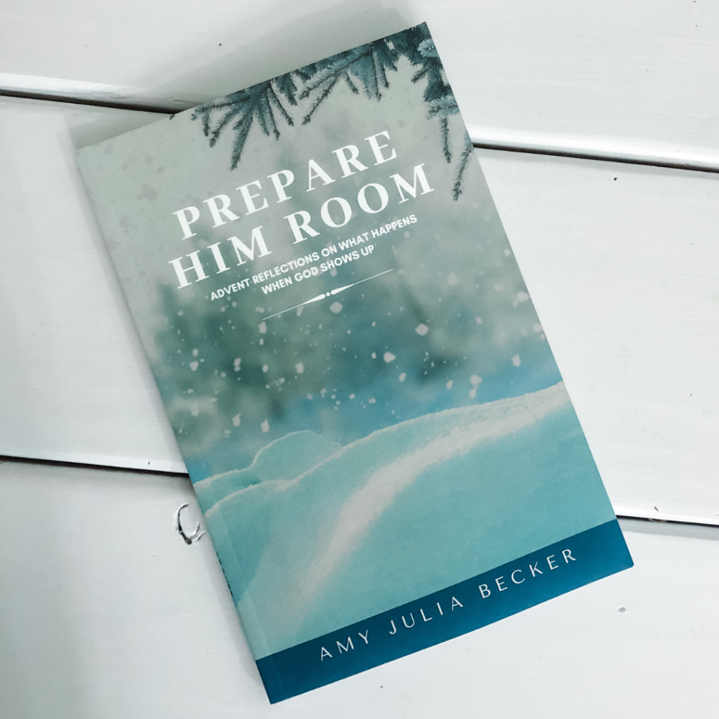 Prepare Him Room advent devotional on a white wooden table