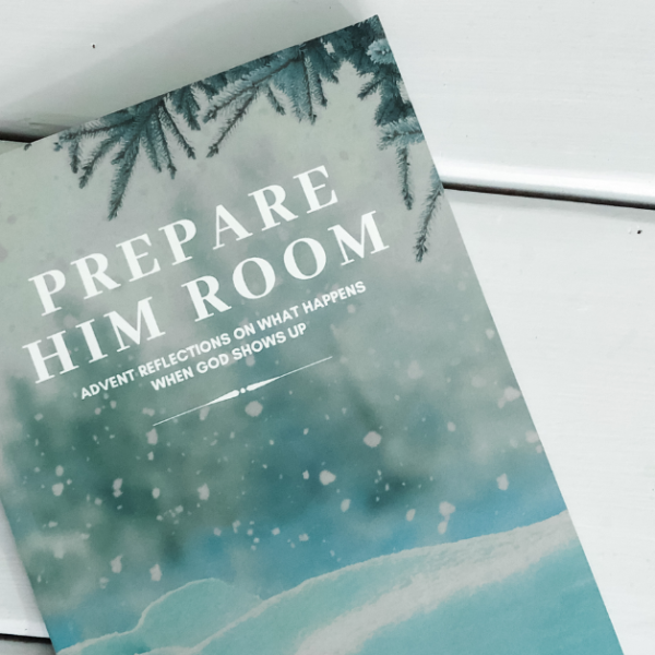Prepare Him Room advent devotional on a white wooden table
