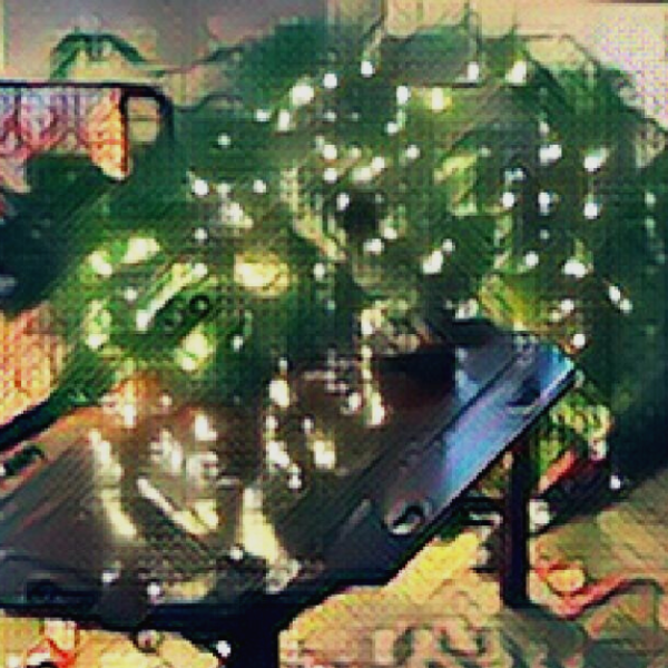 painting filter over a picture a Christmas tree that fell over