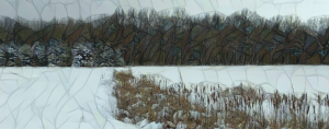 mosaic filter over a photo of tall grasses sticking out of snow and snow-covered trees in the background