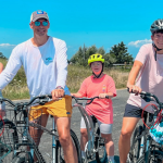 photo of Marilee, Peter, Penny, and William on bikes