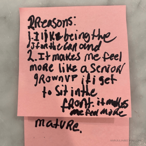 photo of pink post it notes with Penny's reasons for why she wants to sit in the front seat of the car