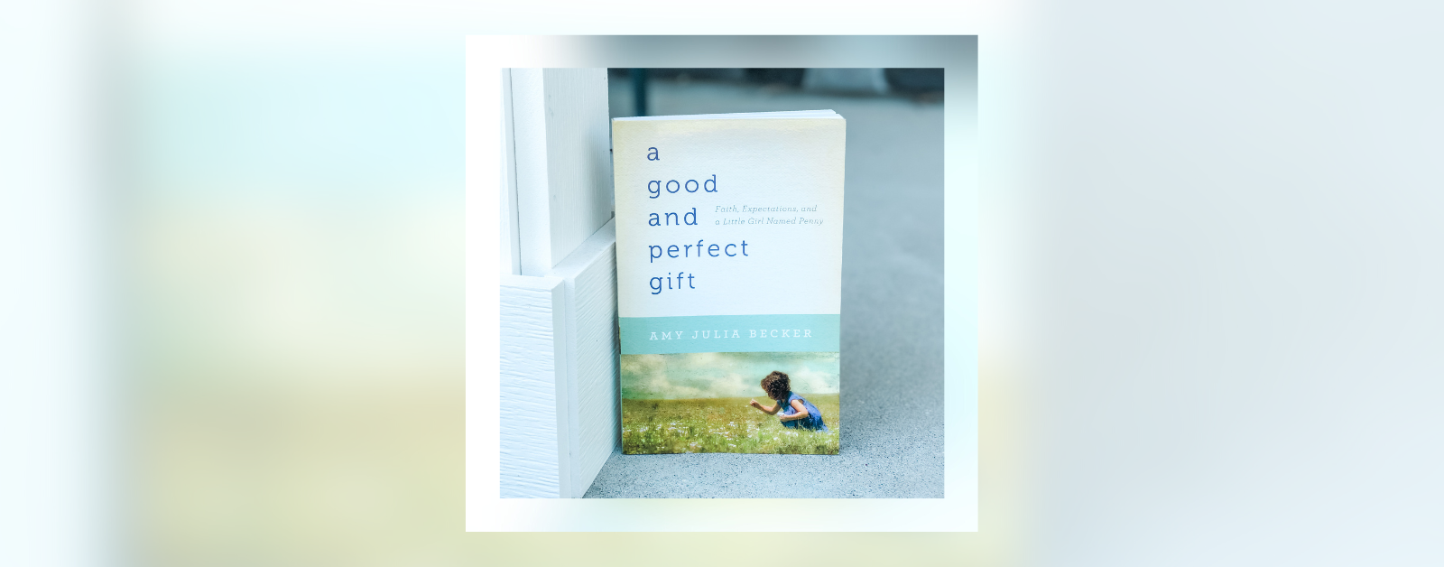 photo of a good and perfect gift book on a porch