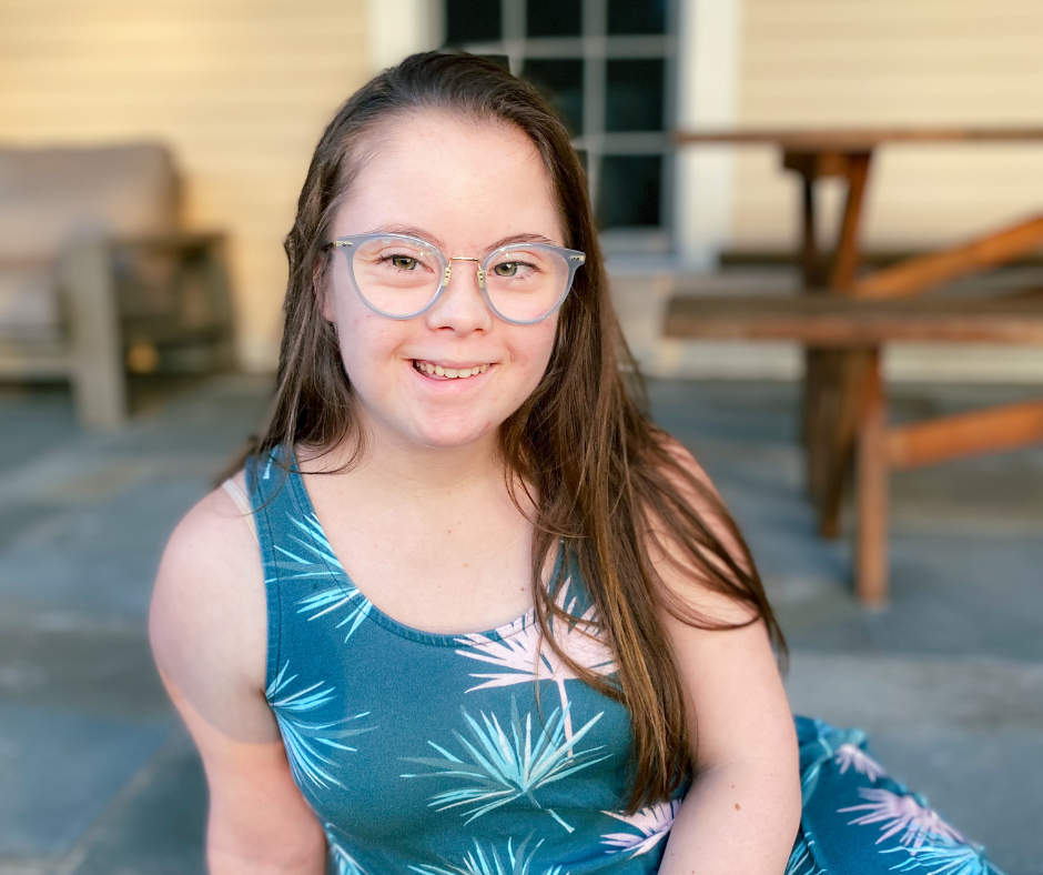 photo of Penny sitting on a patio 