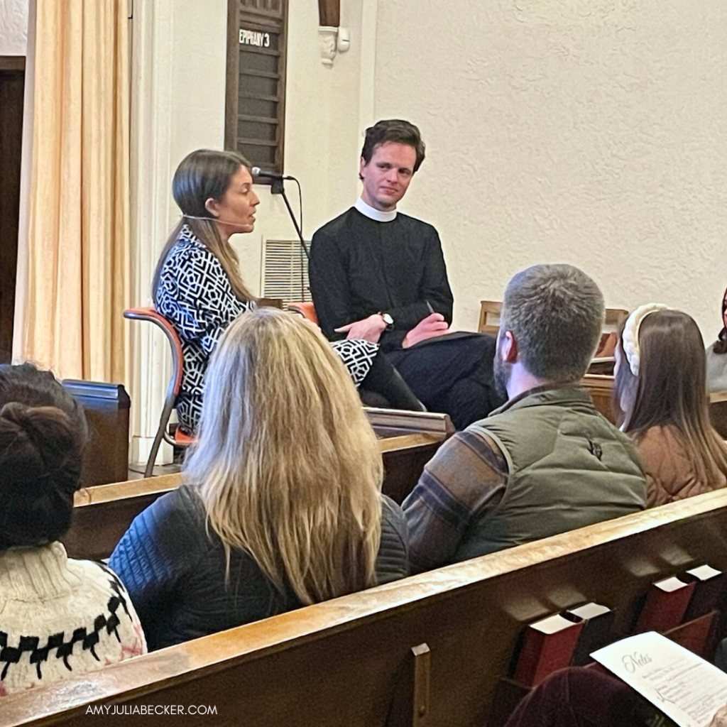 I’m sitting in a tall chair taking part in a Q&A in the church sanctuary.