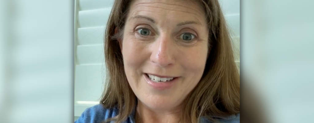 screenshot of Amy Julia outside recording a video about aging