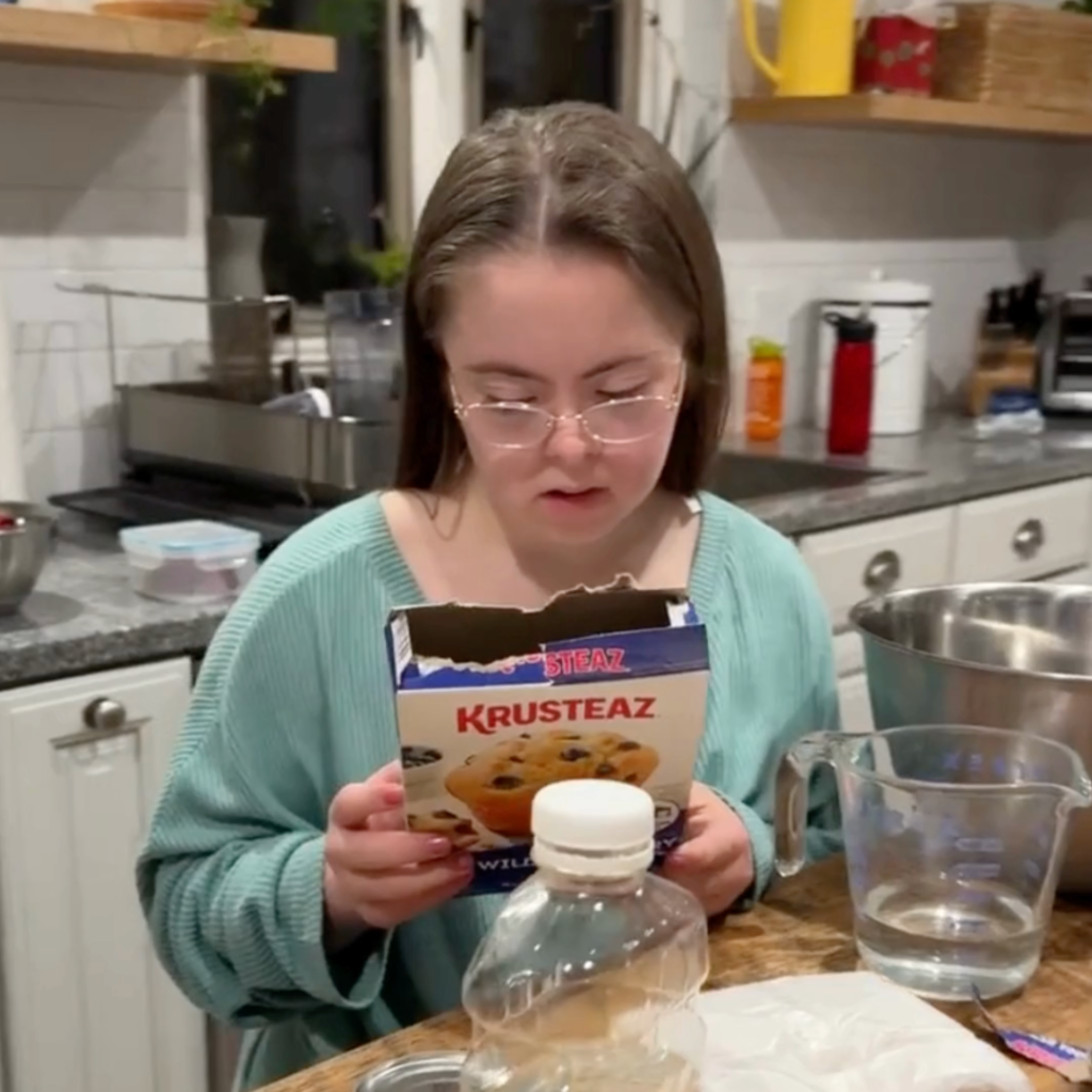 Penny looking at a muffin mix