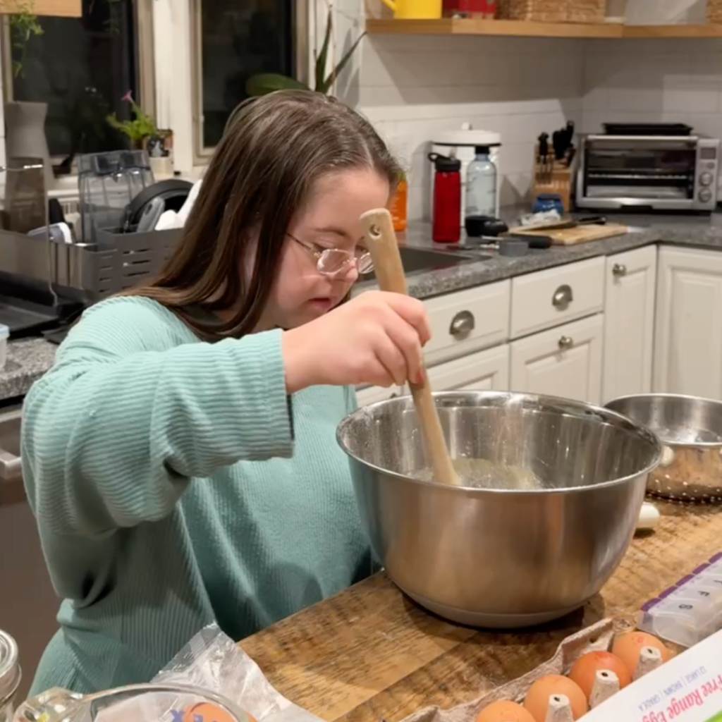 Penny stirring muffin batter