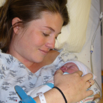 I'm holding newborn Penny in a hospital bed