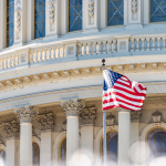 the united states capitol building in washington, dc with a flag flying