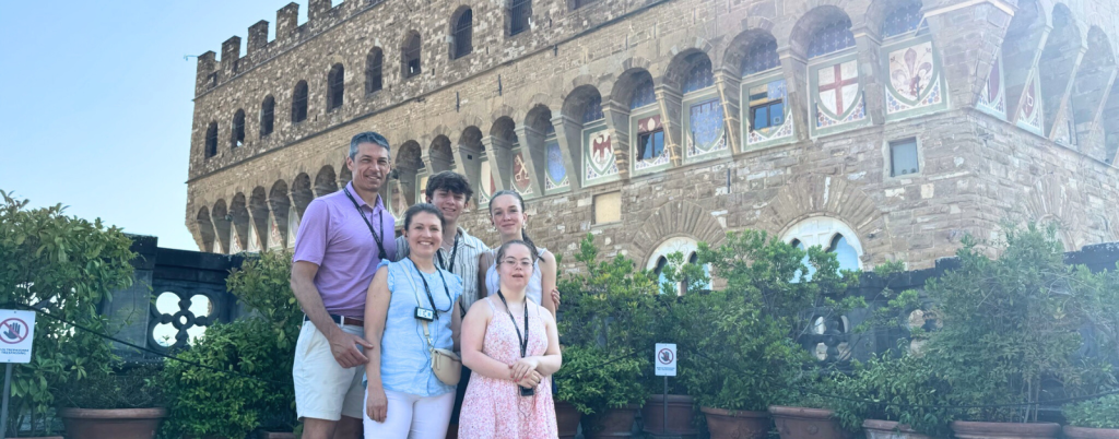 family posing in Italy