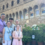 family posing in Italy