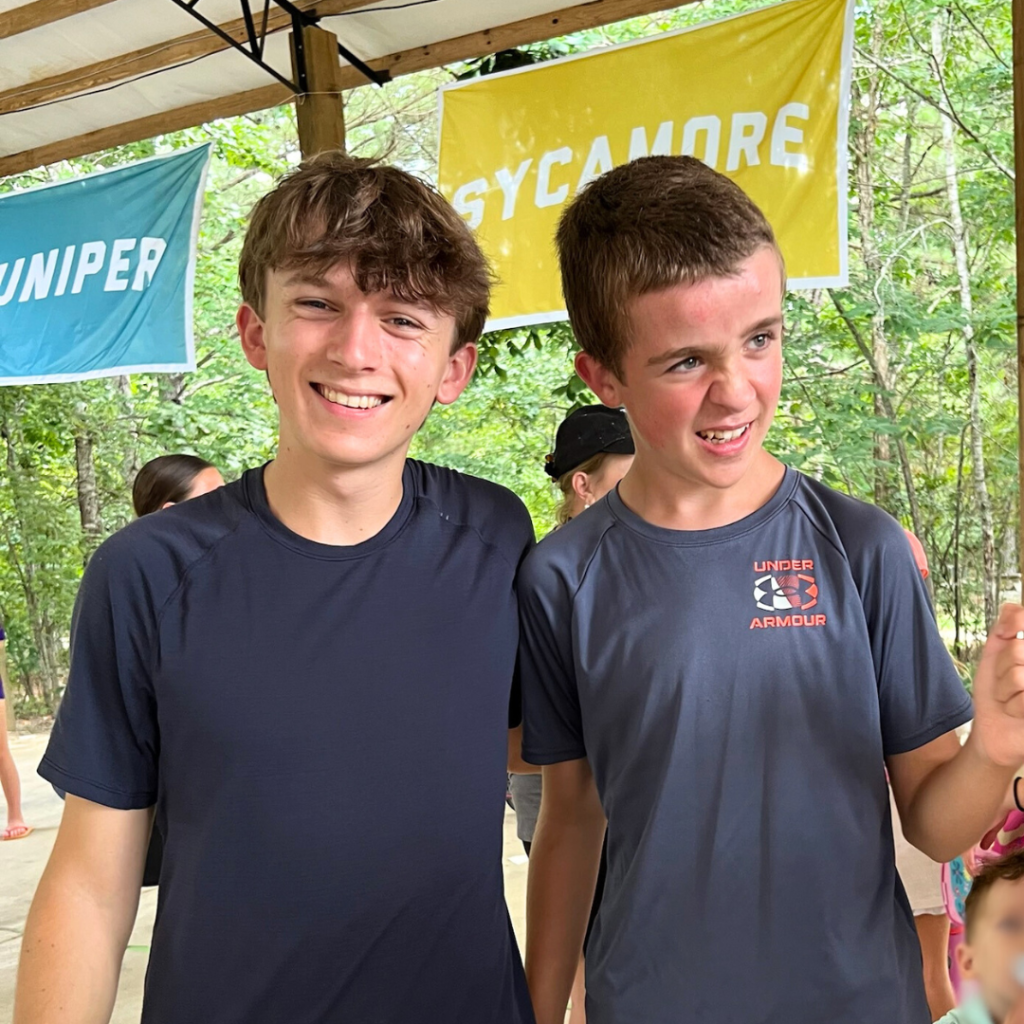 William with his new friend Chase at camp