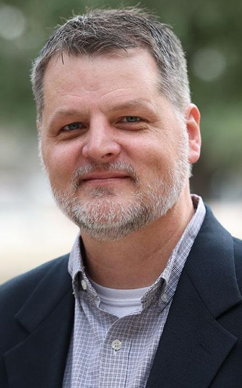 portrait of Erik Carter outside