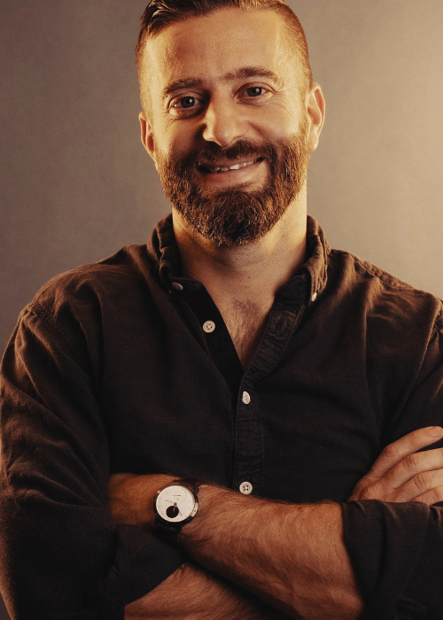 Justin Whitmel Earley poses for an indoor portrait