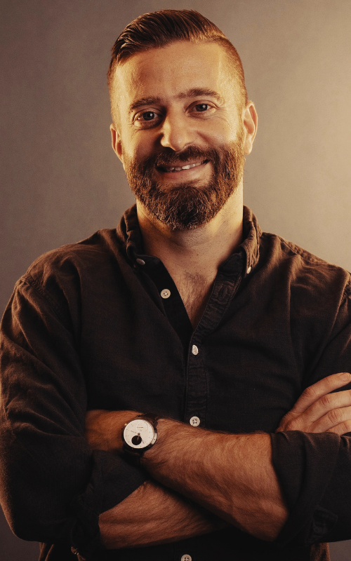 Justin Whitmel Earley poses for an indoor portrait