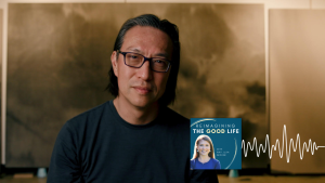 Makoto Fujimura poses for an indoor portrait. In the lower right corner is the cover of the “Reimagining the Good Life with Amy Julia Becker” podcast, along with a white audio waveform graphic.