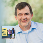 Dr. Curt Thompson poses for a portrait. In the lower left is the cover of the “Take the Next Step with Amy Julia Becker” podcast with Penny, who has Down syndrome, walking with Amy Julia on a dirt path.