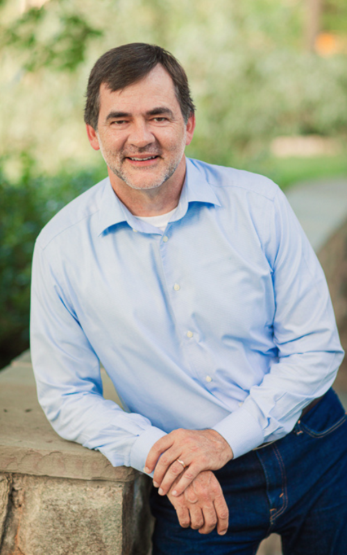 Dr. Curt Thompson poses for a portrait outside
