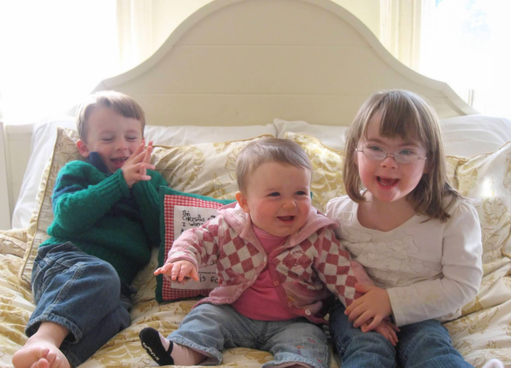 William, Marilee, and Penny on the bed 2011
