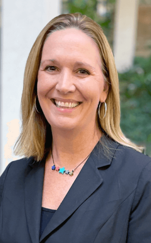 Sheli Reynolds, PhD, poses outside for a portrait