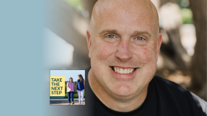 Mike Erre poses for a portrait outside. In the lower left is the cover of the “Take the Next Step with Amy Julia Becker” podcast with Penny, who has Down syndrome, walking with Amy Julia on a dirt path.