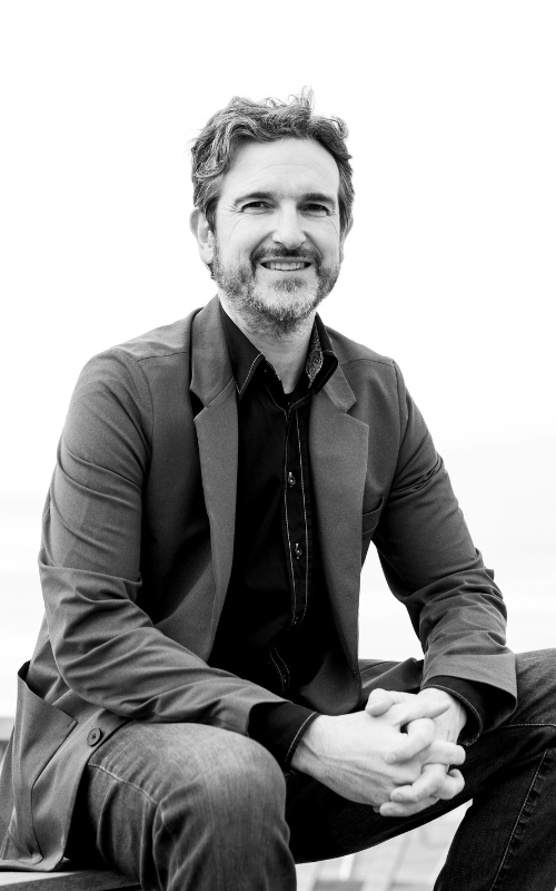 Craig Thomas smiles for a portrait