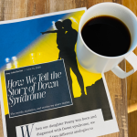 A printed article titled “How We Tell the Story of Down Syndrome” by Amy Julia Becker lies on a wooden table beside a white mug of black coffee. The article features a silhouette of an adult holding a child against a blue and yellow background and includes the subtitle, “The words, statistics, and stories we share matter.”