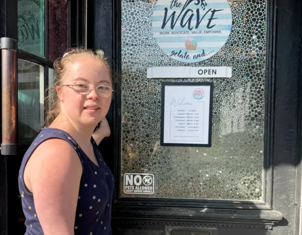 Penny stands outside The Wave ice cream shop