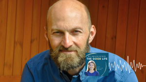 Brian Brock, PhD smiles for portrait. In the lower right corner is the logo of the “Reimagining the Good Life with Amy Julia Becker” podcast, along with a white audio waveform graphic.