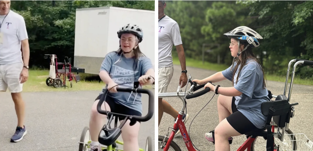Penny trying out adaptive bikes while Peter walks next to her