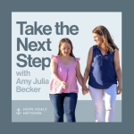 A podcast cover image with the title "Take the Next Step with Amy Julia Becker" in bold navy text on a light blue background. Beside the text, Penny and Amy Julia walk hand in hand, with Amy Julia looking toward Penny.