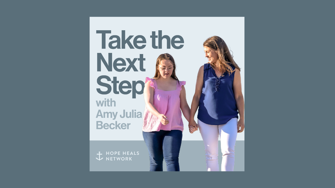 A podcast cover image with the title "Take the Next Step with Amy Julia Becker" in bold navy text on a light blue background. Beside the text, Penny and Amy Julia walk hand in hand, with Amy Julia looking toward Penny.