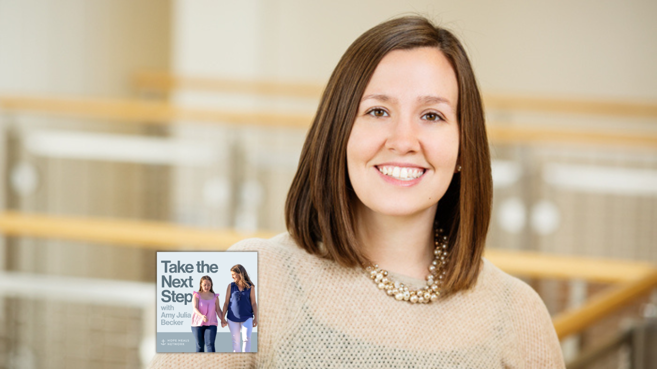 Meghan Burke poses for a portrait inside. In the bottom middle is a small image of the podcast logo where Penny and Amy Julia walk hand in hand, with Amy Julia looking toward Penny.
