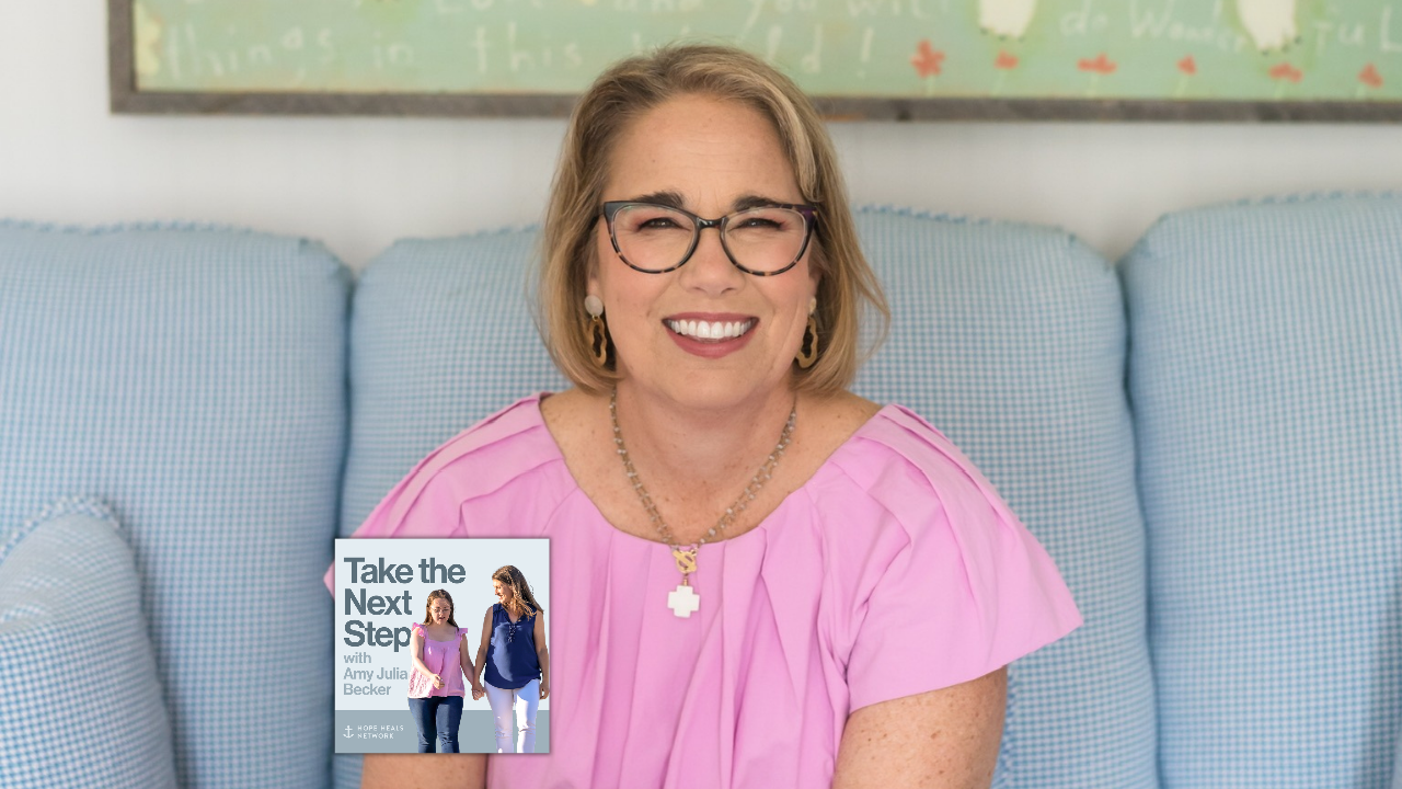 Sissy Goff sits a light blue couch in a bright room. In the bottom middle is a small image of the podcast logo where Penny and Amy Julia walk hand in hand, with Amy Julia looking toward Penny.