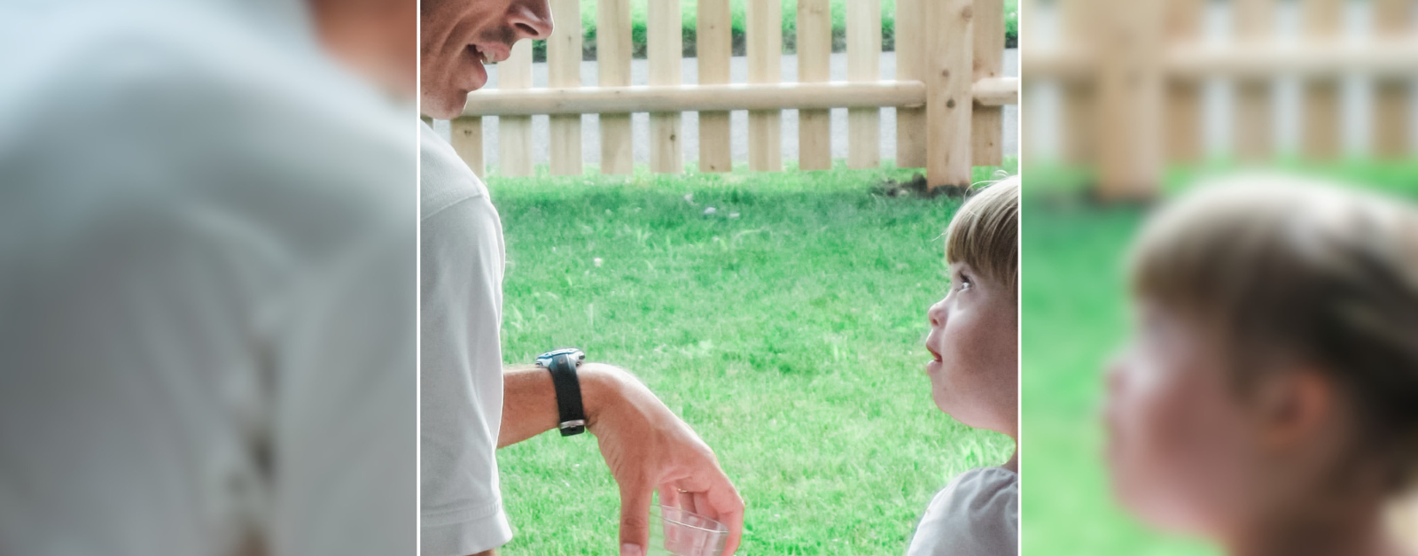 2009 photo of Peter and Penny sitting on a porch and look into each other's eyes. Green grass and a wooden fence are in the background
