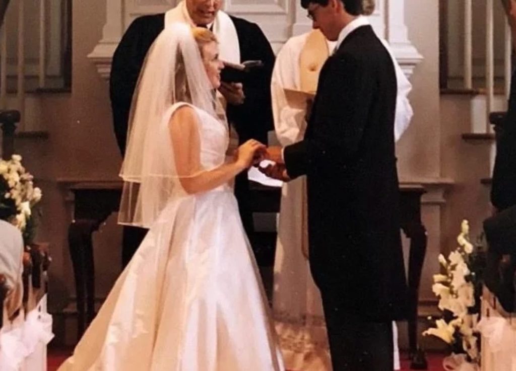 Peter and I stand at the front of a church reciting our vows to each other on our wedding day]