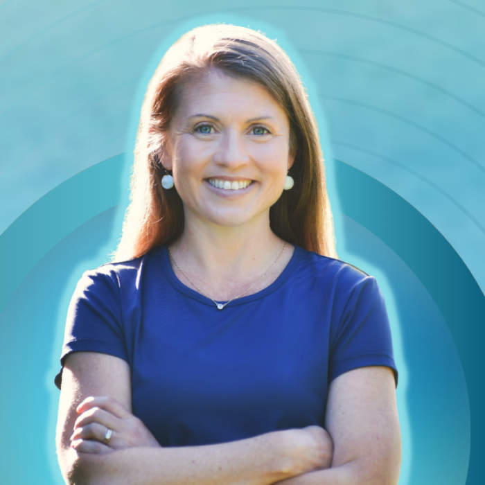 gradient blue graphic with a cutout picture of Amy Julia, her arms folded in front of her, and text that says: Love Is Stronger Than Fear with Amy Julia Becker