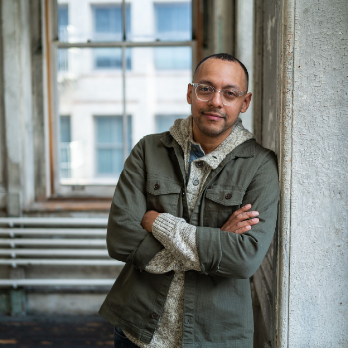 AJB-featured season 8(1560 × 628 px) rich villodas dark blue graphic with geometric shape overlays and the Reimagining the Good Life with Amy Julia Becker podcast logo in bottom right corner. In the middle of the graphic is a photo of Rich Villodas.