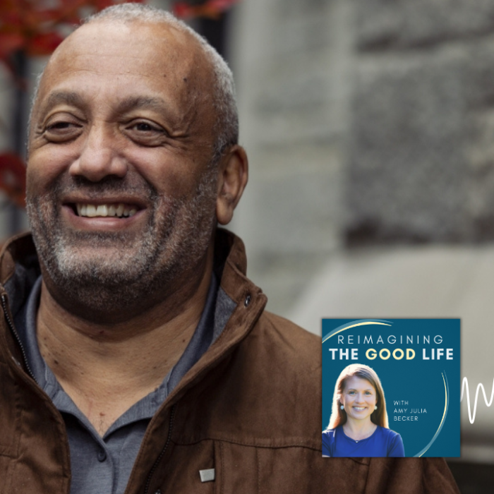 SocialWebCover – RGL John Swinton A smiling John Swinton stands outdoors wearing a brown jacket, with red autumn leaves and a stone wall in the background. In the lower right corner is the cover of the “Reimagining the Good Life with Amy Julia Becker” podcast, along with a white audio waveform graphic.