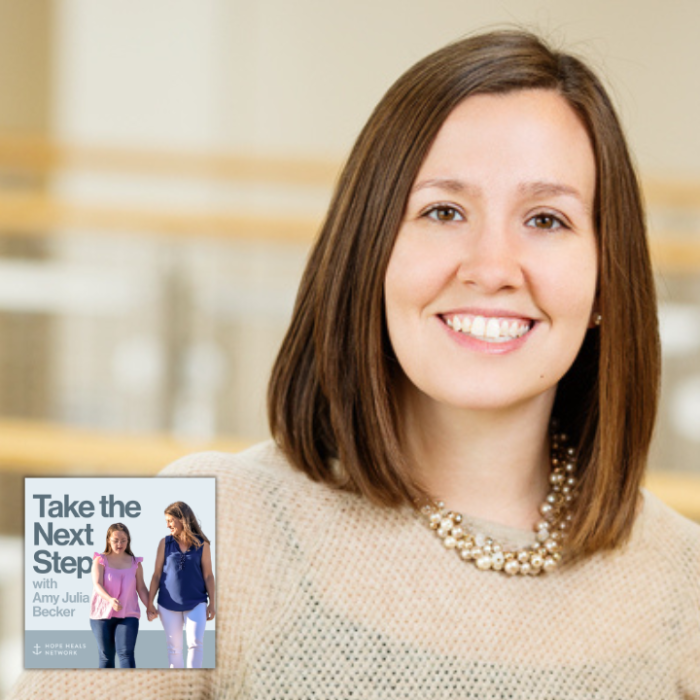 Meghan Burke poses for a portrait inside. In the bottom middle is a small image of the podcast logo where Penny and Amy Julia walk hand in hand, with Amy Julia looking toward Penny.