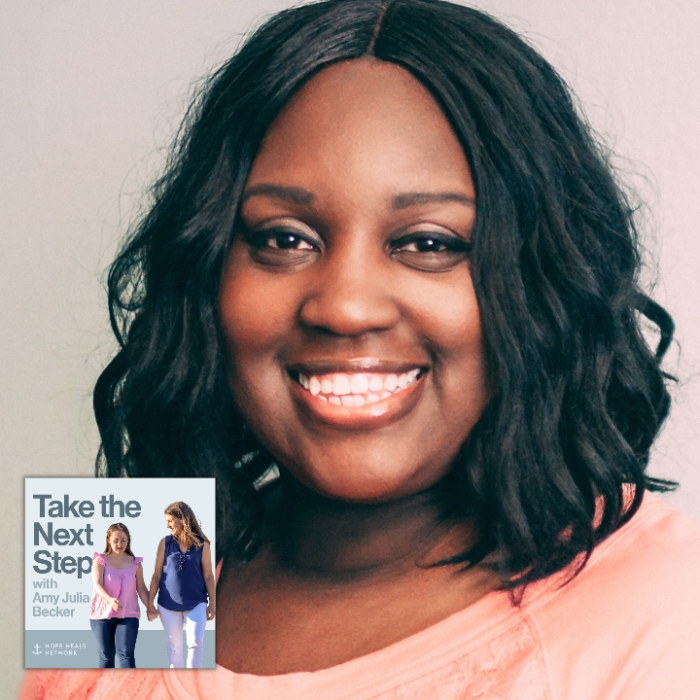 Nakoa Dantzler Merritt poses for an indoor portrait. In the bottom middle is a small image of the podcast logo where Penny and Amy Julia walk hand in hand, with Amy Julia looking toward Penny.
